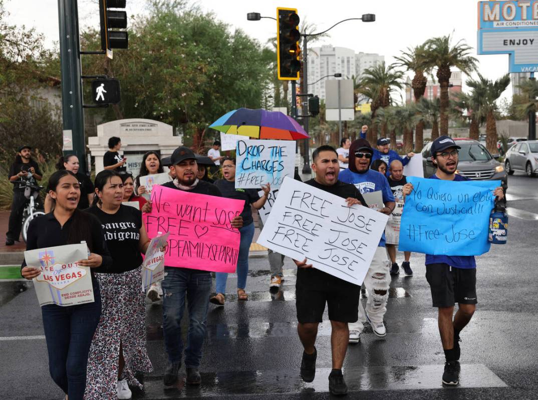 People rally outside the U.S. Immigration and Customs Enforcement offices in downtown Las Vegas ...