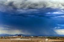 Storms move across the area and dump lots of rain about the central part of the city on Friday, ...