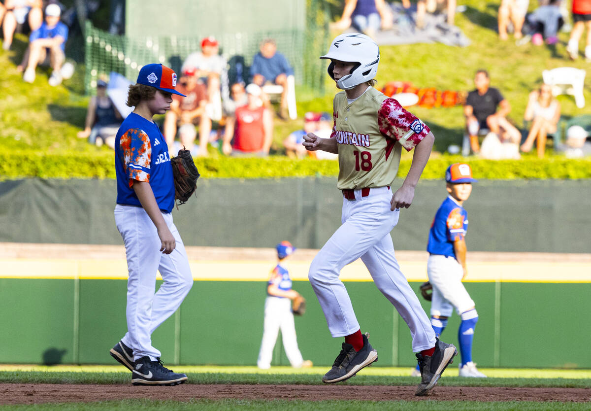 The Henderson All-Stars shortstop Nolan Gifford runs the bases after hitting a three-run homer ...