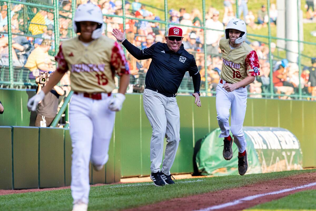 The Henderson All-Stars shortstop Nolan Gifford (18) celebrates with teammate David Edwards (15 ...