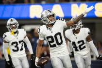 Las Vegas Raiders safety Isaiah Pola-Mao (20) celebrates his touchdown on an interception durin ...