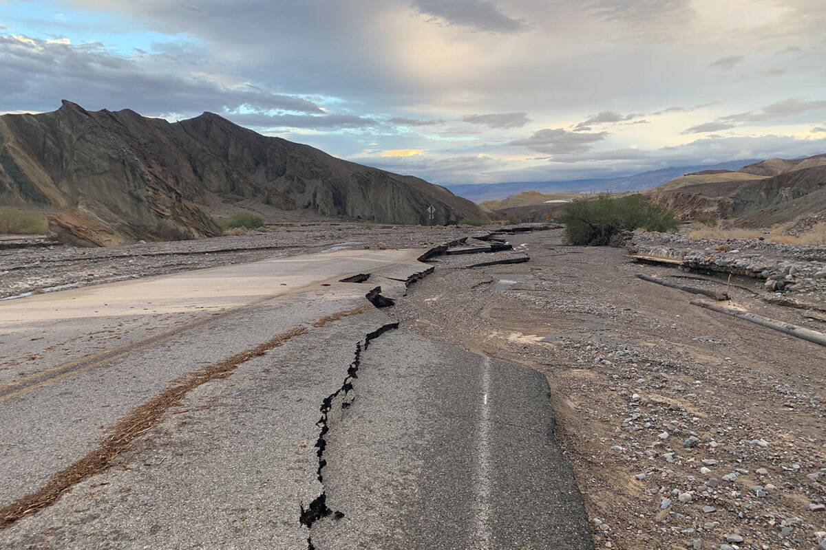 Flooding from heavy rain damaged CA-190 between Zabriskie Point and Furnace Creek. Photo taken ...