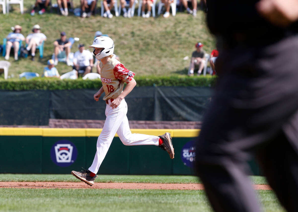 The Henderson All-Stars centerfield Nolan Gifford runs bases after hitting a solo home run agai ...