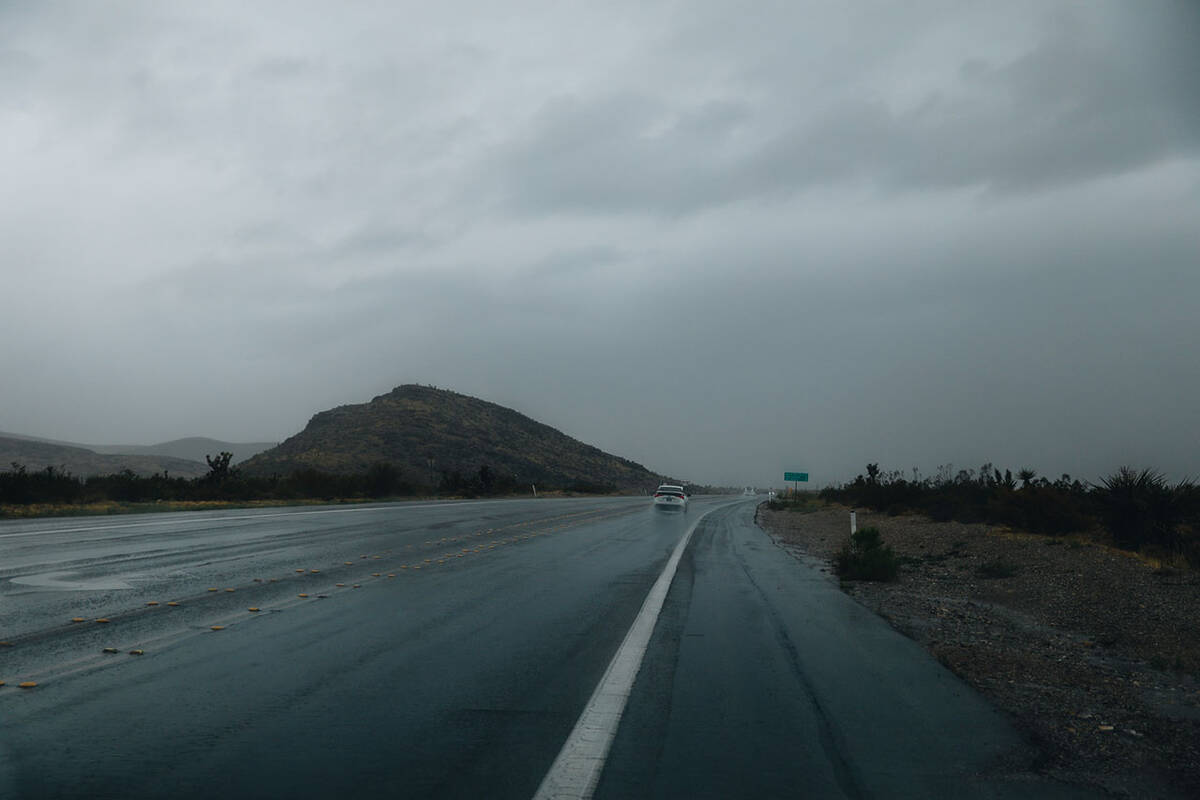 Fog and rain from storms developed by Hurricane Hilary are seen in the Red Rock National Conser ...