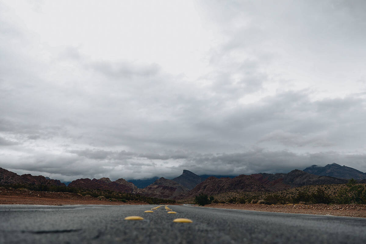 Storms brew in the sky from Hurricane Hilary in the Red Rock National Conservation Area on Sund ...