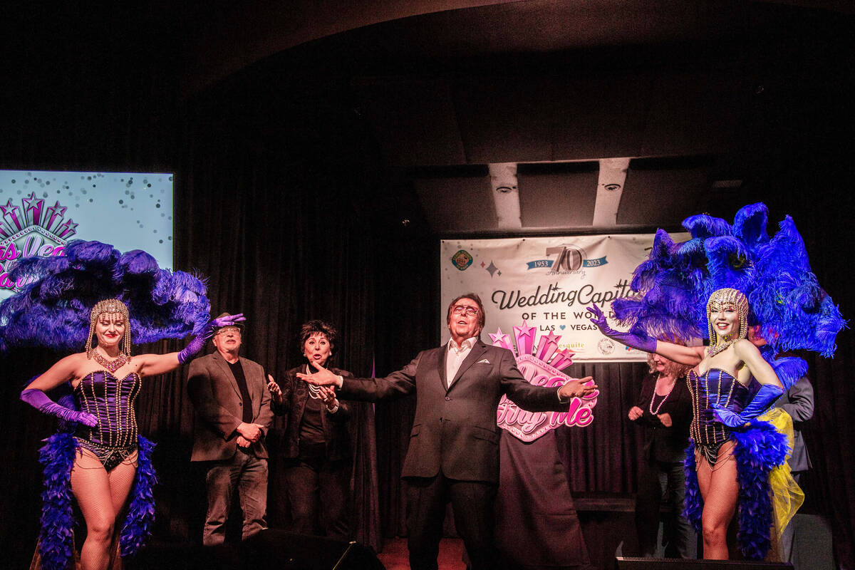 Dennis Bono, middle, at the preview event of the 70th anniversary of Las Vegas being the "Weddi ...