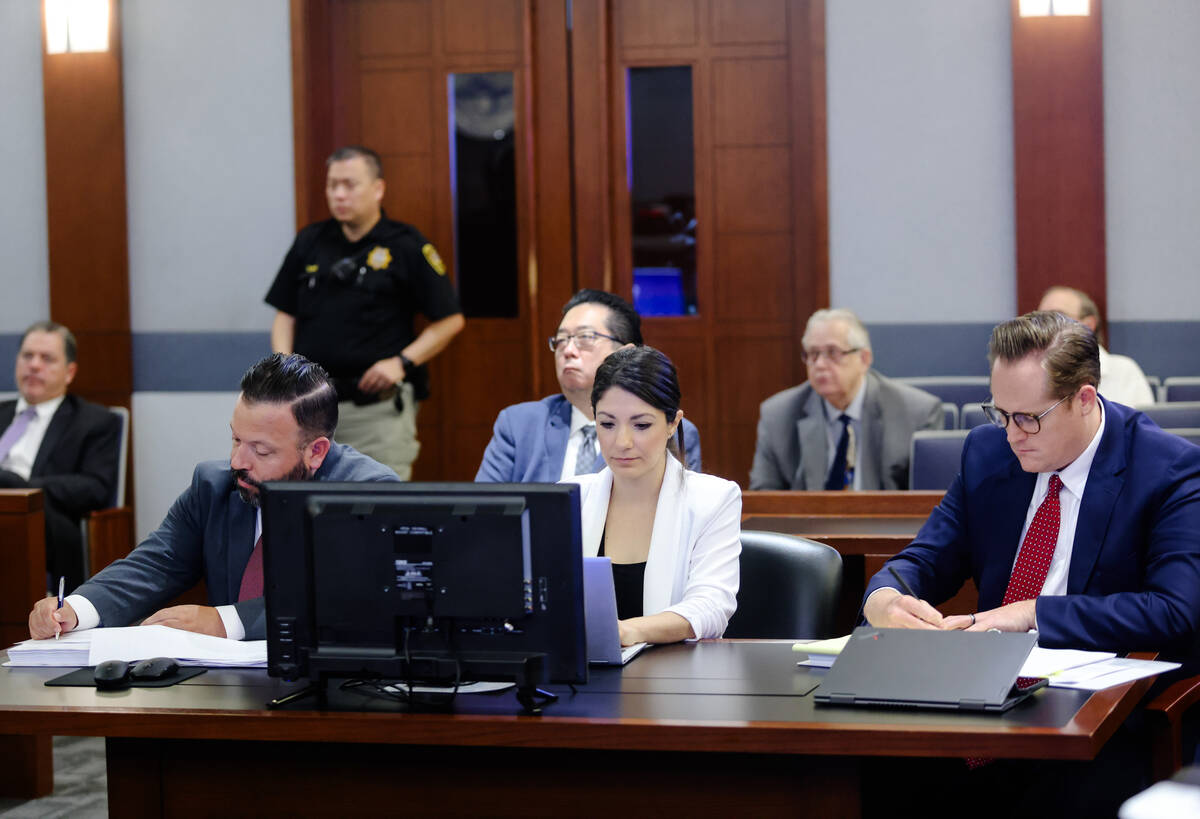 Attorneys Ethan Thomas, from left, Crystal Herrera, center, and Andrew Clark, right, representi ...