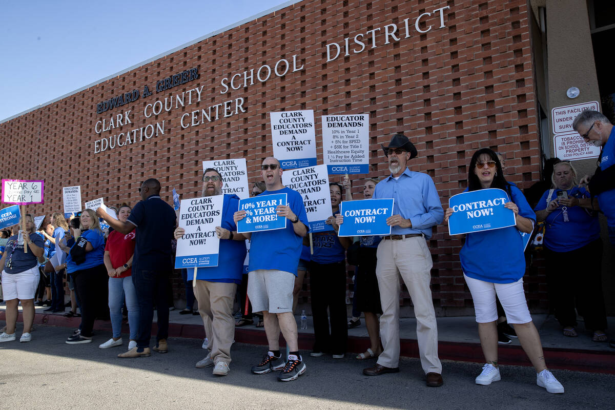 Clark County Education Association teachers union members protest outside CCSD’s Greer E ...