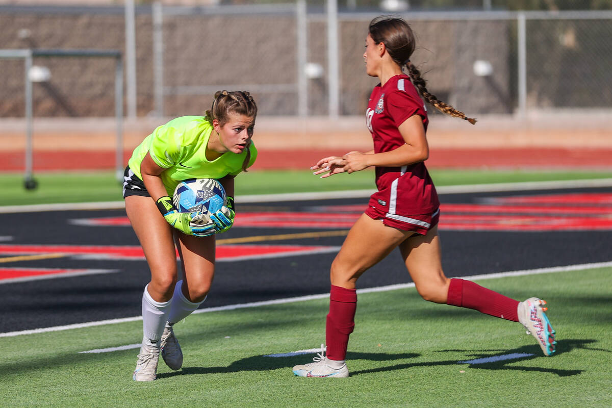 Foothill goalkeeper Kaitlyn Minghelli (1) blocks a shot taken by Desert Oasis’ Erica Moreno ...