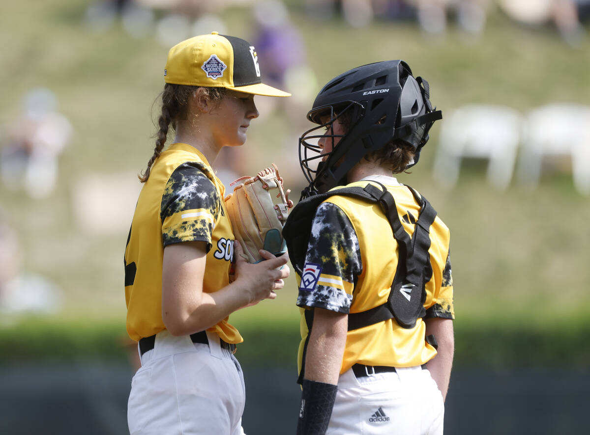 Nolensville, Tennessee pitcher Stella Weaver and catcher Corbin Cyphers discuss on the mound du ...