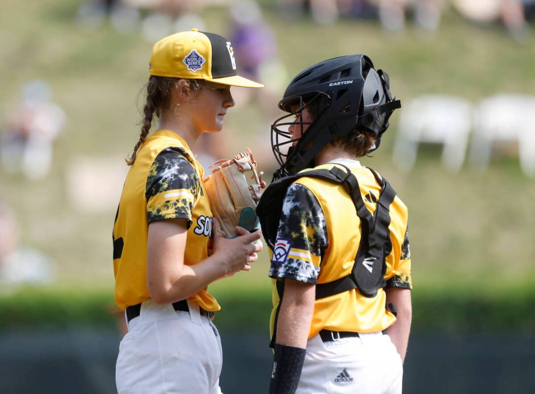 Nolensville, Tennessee pitcher Stella Weaver and catcher Corbin Cyphers discuss on the mound du ...