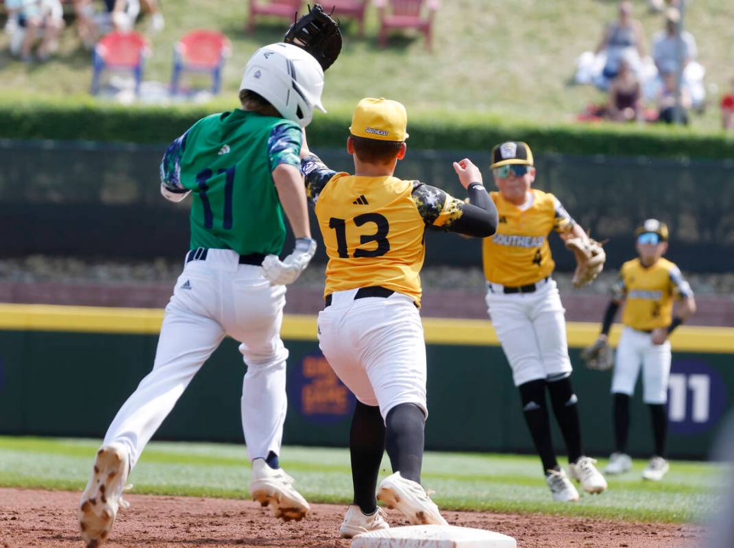 Seattle, Washington, pitcher Trey Kirchoff (17) forced out by Nolensville, Tennessee third base ...