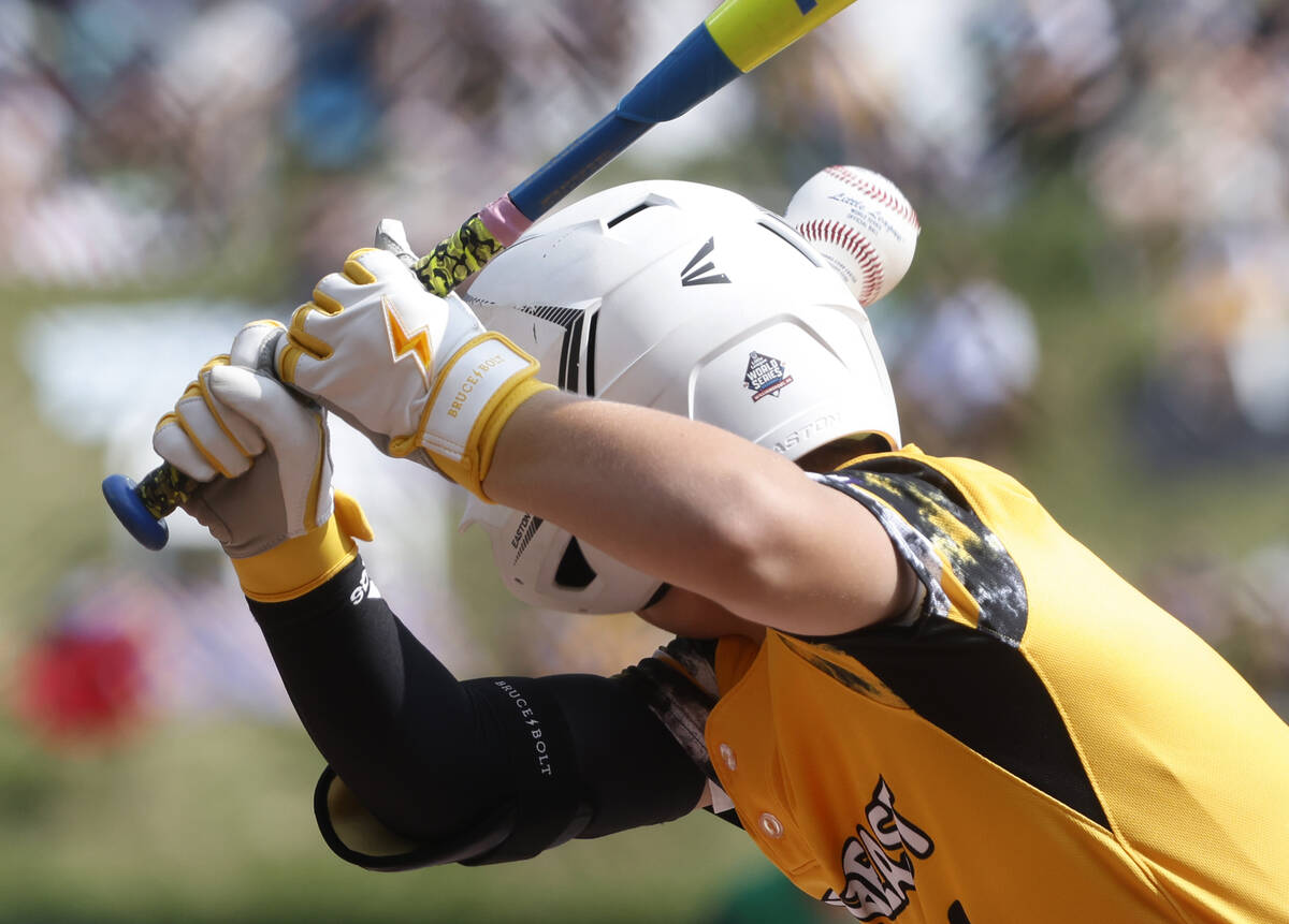 Nolensville, Tennessee, second baseman Turner Blalock is hit by Seattle, Washington, pitcher Tr ...