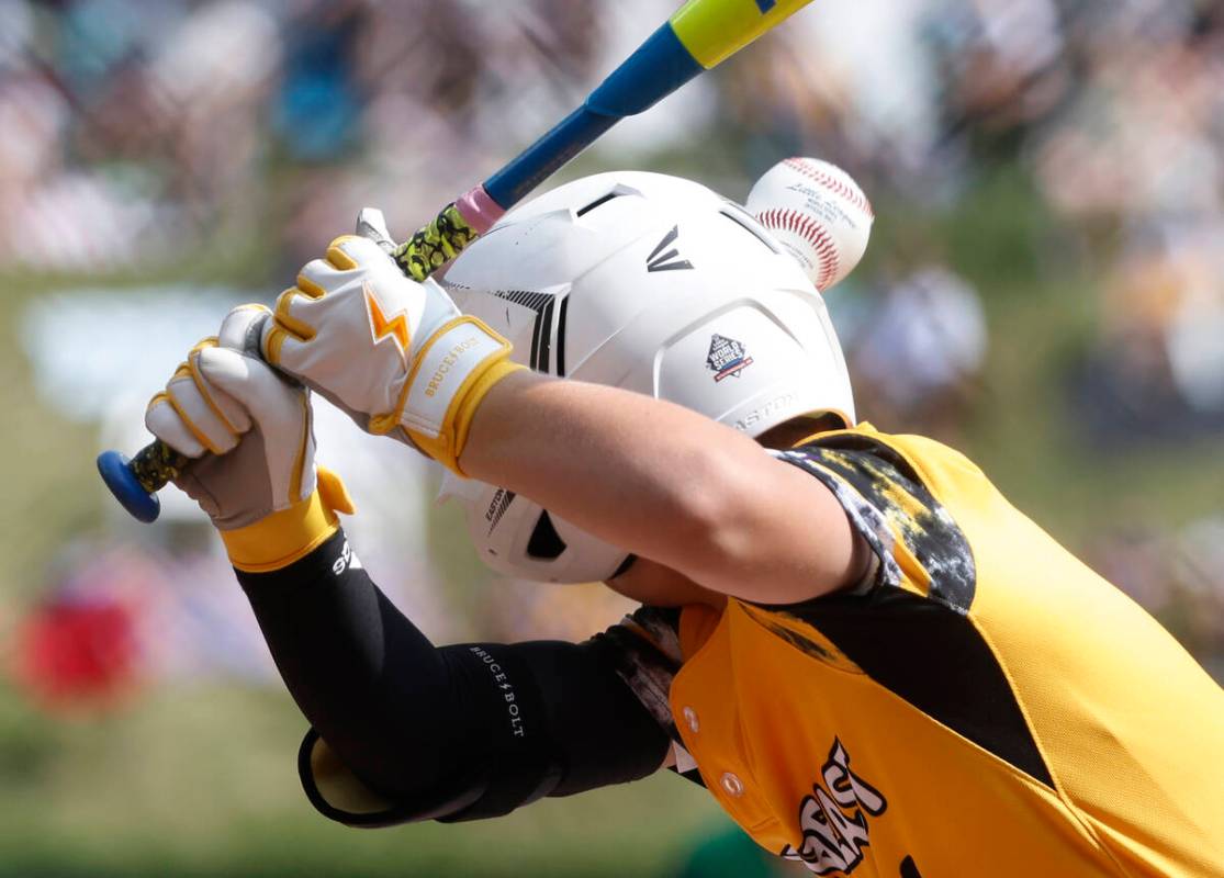 Nolensville, Tennessee, second baseman Turner Blalock is hit by Seattle, Washington, pitcher Tr ...