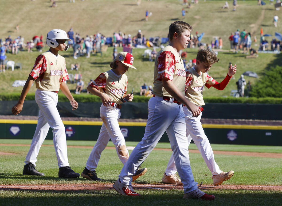 The Henderson All-Stars leave the field after a loss to Nolensville, Tennessee, during the Litt ...