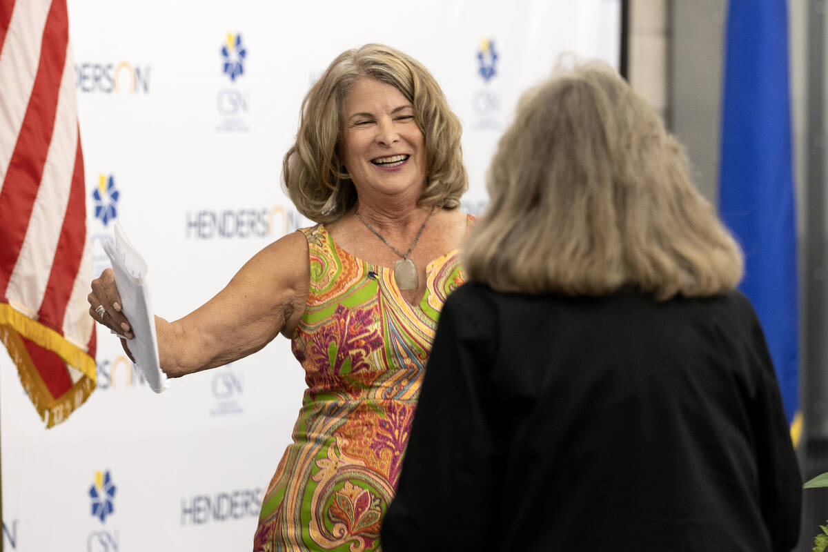 Former Henderson Mayor Debra March greets Rep. Dina Titus, D-Nev., during the opening of Debra ...