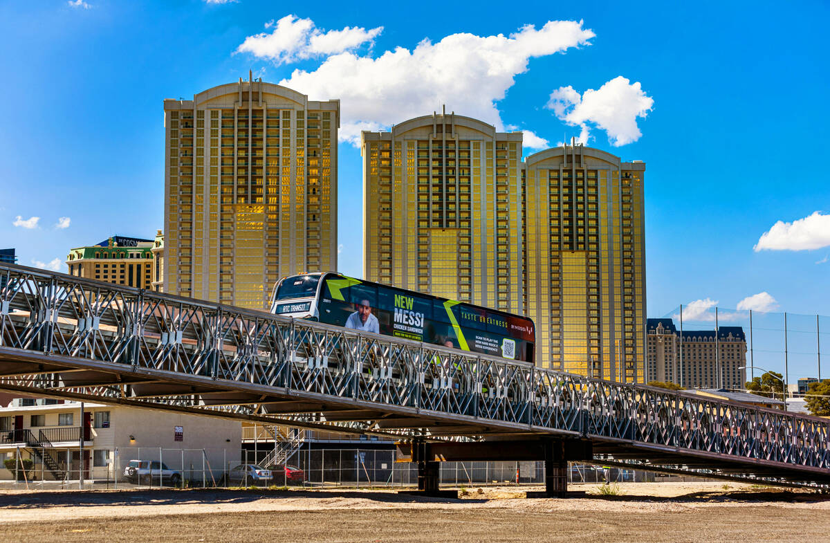 An RTC bus drives across a span as the Las Vegas Grand Prix, Inc. gives a preview of the tempor ...