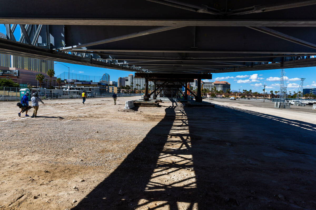 Members of the media walk beside a span as the Las Vegas Grand Prix, Inc. gives a preview of th ...