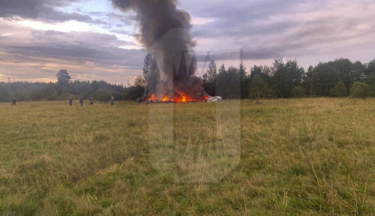 This image released by Ostorozhno Novosti on Wednesday, Aug. 23, 2023, shows the crash site of ...