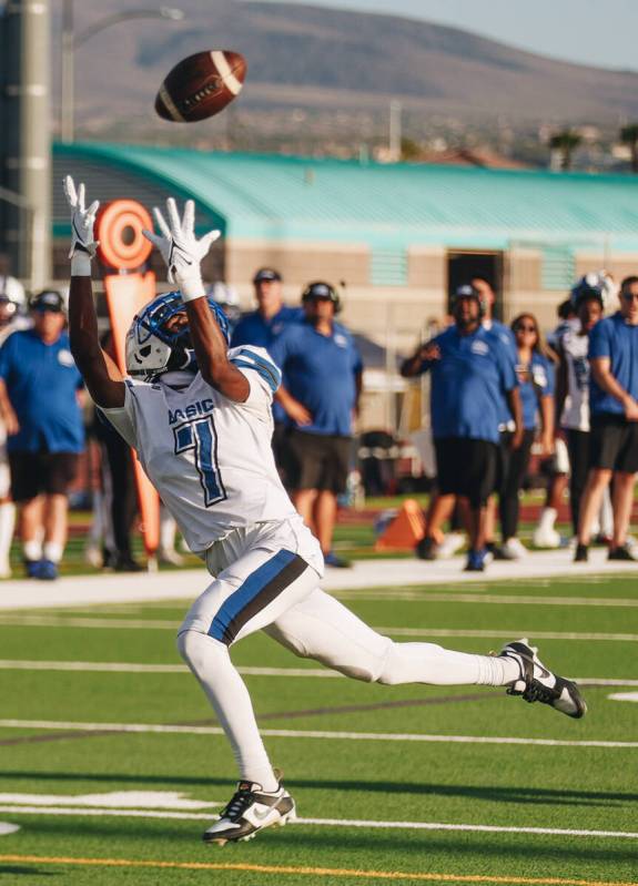 Basic wide receiver Donovan Glover catches the ball during a game against Silverado at Silverad ...