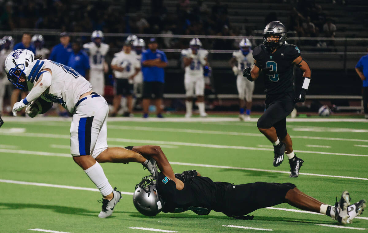 Basic running back Boston Wren (24) gets his foot caught on a Silverado player during a game at ...