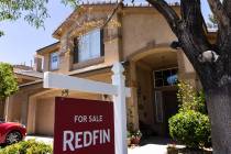 REDFIN's for sale sign is posted outside a single family house at Novara Lane on Wednesday, Jun ...