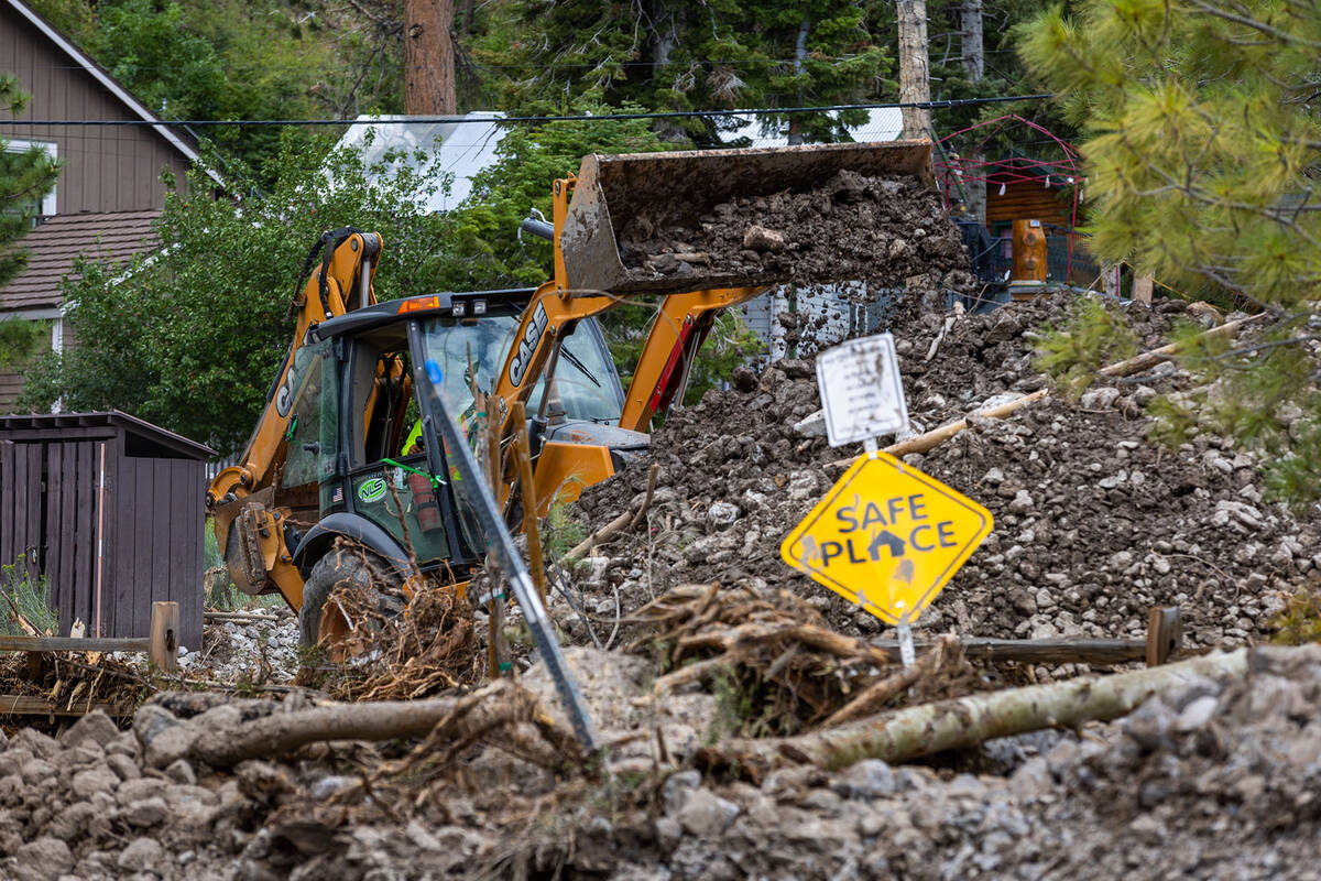 Debris is piled up in Old Town as cleanup from the extensive damage of tropical storm Hilary co ...