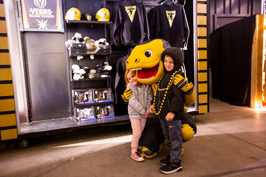 Golden Knights mascot Chance poses with Meadow V., 4, left, and her brother, Jax V., 6, of Las ...