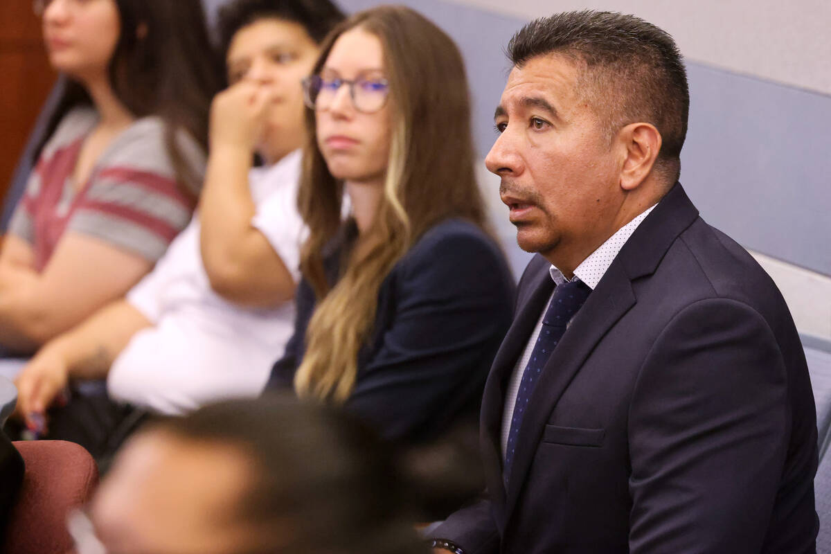 Former Alpine Motel Apartments owner Adolfo Orozco-Garcia, right, waits to apper in Clark Count ...