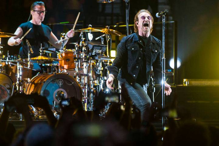 Larry Mullen Jr., left, and Bono of U2 perform at T-Mobile Arena in Las Vegas on Friday, May 11 ...