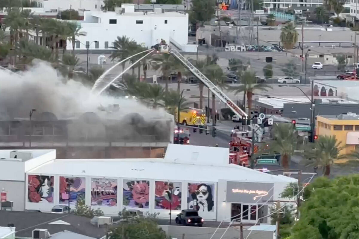 A fire burns near Charleston Boulevard and Third Street on Tuesday, Aug. 29, 2023. (John Katsil ...