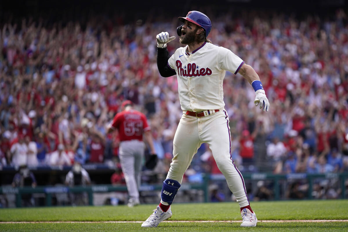 Philadelphia Phillies' Bryce Harper reacts after hitting a two-run home run against Los Angeles ...