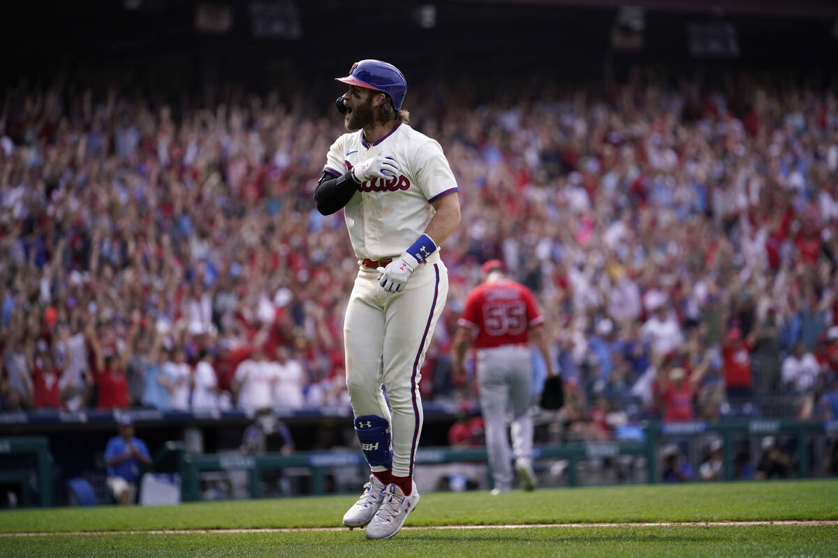 Philadelphia Phillies' Bryce Harper reacts after hitting a two-run home run against Los Angeles ...