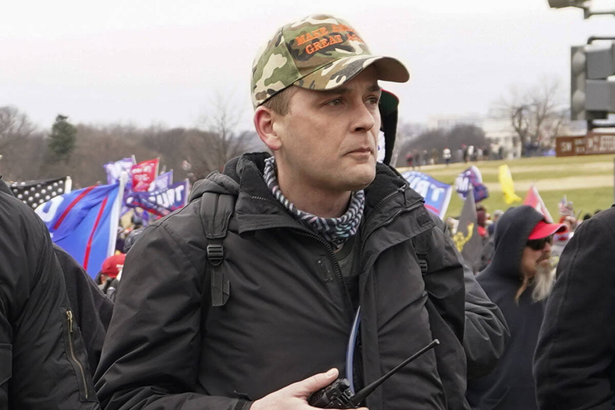 FILE - Proud Boys member Zachary Rehl walks toward the U.S. Capitol in Washington, in support o ...