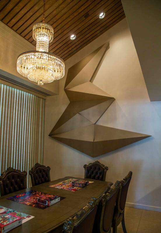 A Bill Arms sculpture piece hangs in the dining room during a tour of Lefty Rosenthal's former ...