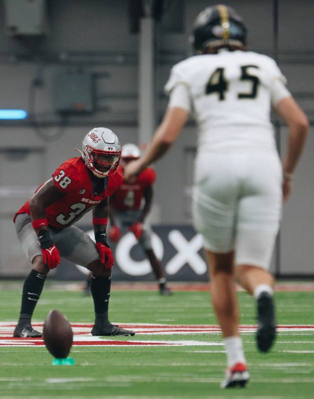 UNLV linebacker Marsel McDuffie (38) waits for Bryant kicker Ethan Gettman (45) to kick the bal ...