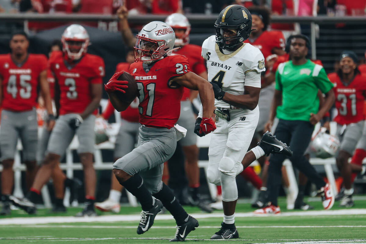 UNLV wide receiver Jacob De Jesus (21) runs the ball down the field during a game against Bryan ...