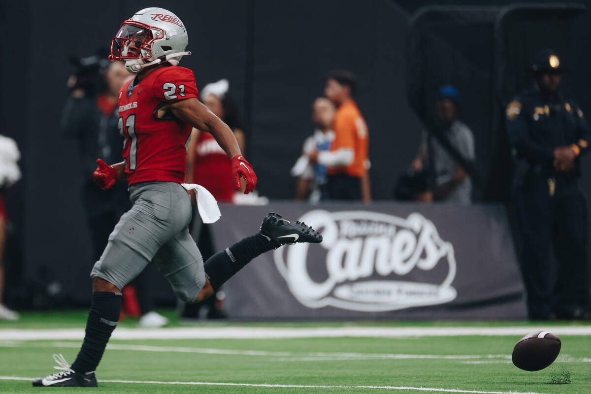 UNLV wide receiver Jacob De Jesusmisses the ball after a pass from a teammate during a game aga ...