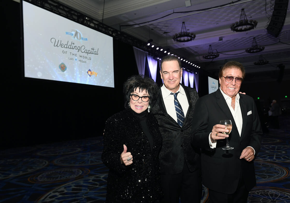 (L-R) Lorraine Hunt-Bono, actor Patrick Warburton and singer Dennis Bono attend a wedding vow r ...