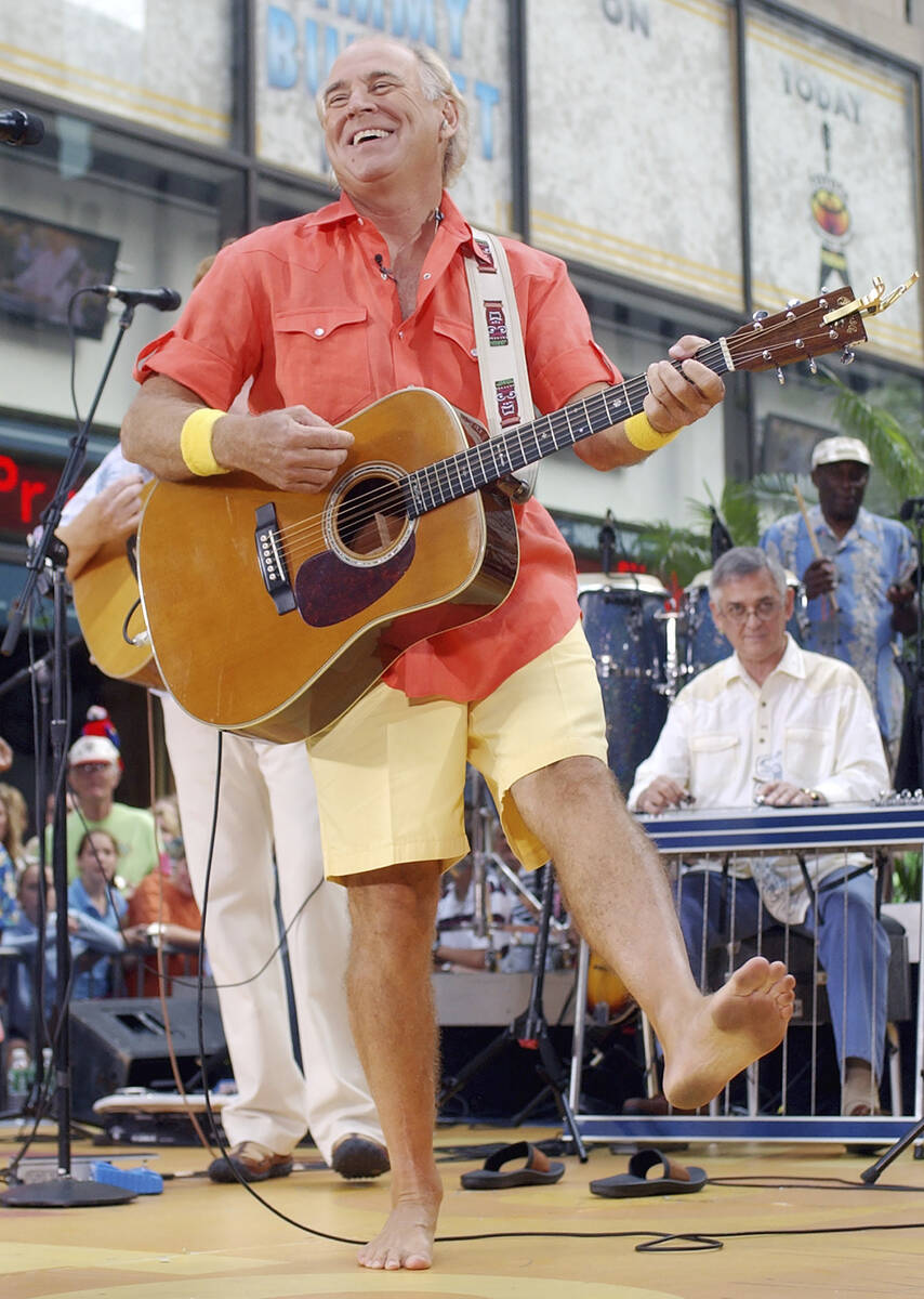 Singer Jimmy Buffet performs barefooted with his band The Coral Reefers on the NBC "Today" tele ...