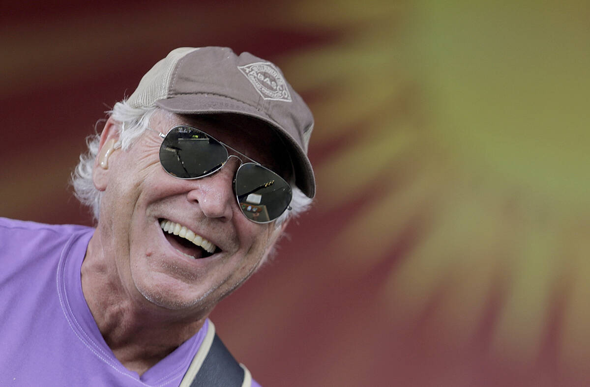 FILE - Jimmy Buffett performs on the Acura Stage during the New Orleans Jazz and Heritage Festi ...