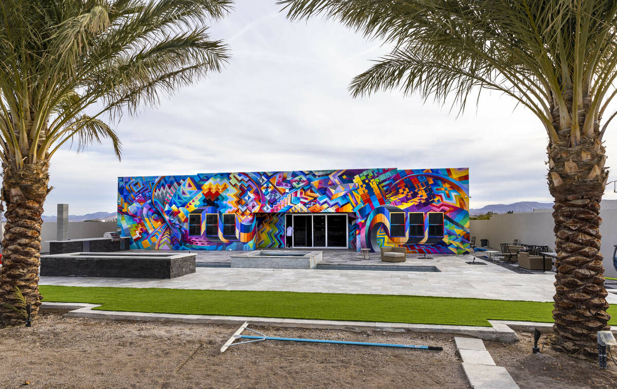 Minerva Marketing CEO Brandon Bowsky's former home, with a variety of art inside and a mural pa ...