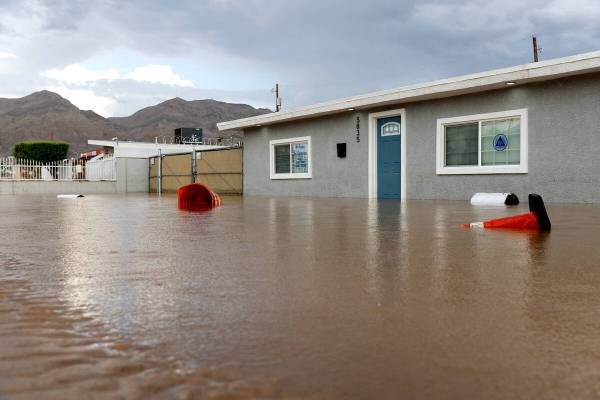 A building is flooded above its door frame on Saturday, Sept. 2, 2023, in Sunrise Manor in the ...
