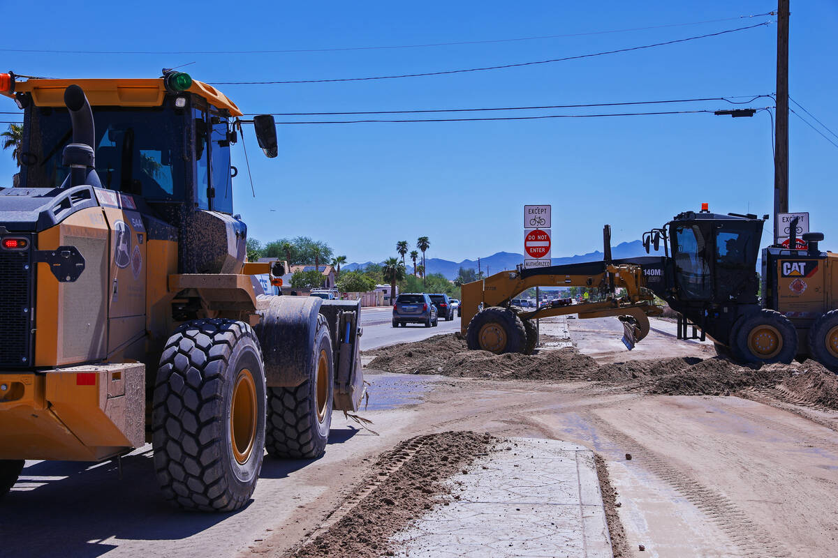 Public Works clears debris off of Hollywood Boulevard in the aftermath of the damaging flash fl ...