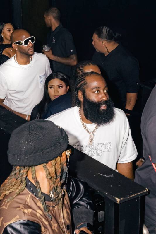 Philadelphia 76ers star James Harden (in beard) is shown at Travis Scott's pop-up DJ set at Dra ...