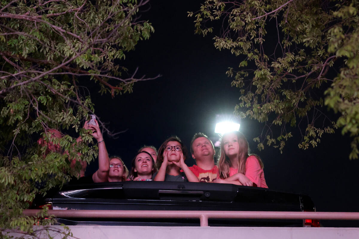 The Sphere lights up people on Manhattan Street near the Strip in Las Vegas Wednesday, Aug. 16, ...