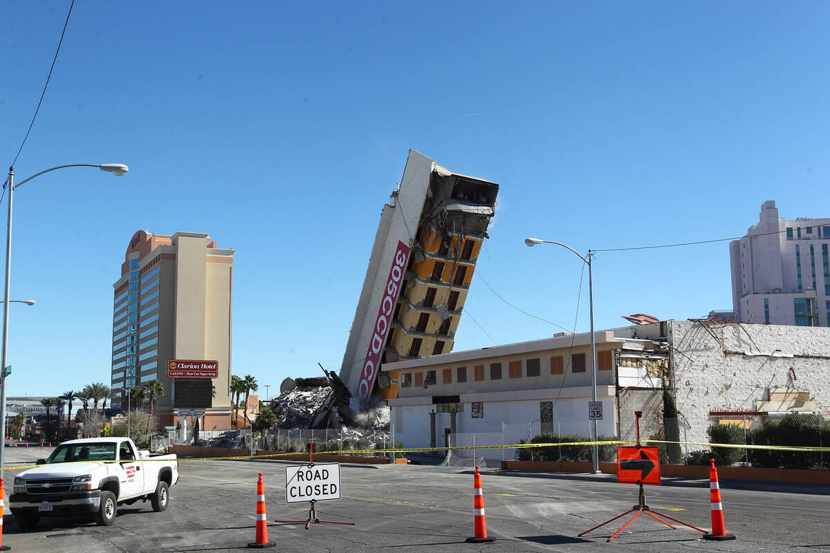 Most of remaining portion of The Clarion is brought down by a demolition crew after an early-mo ...