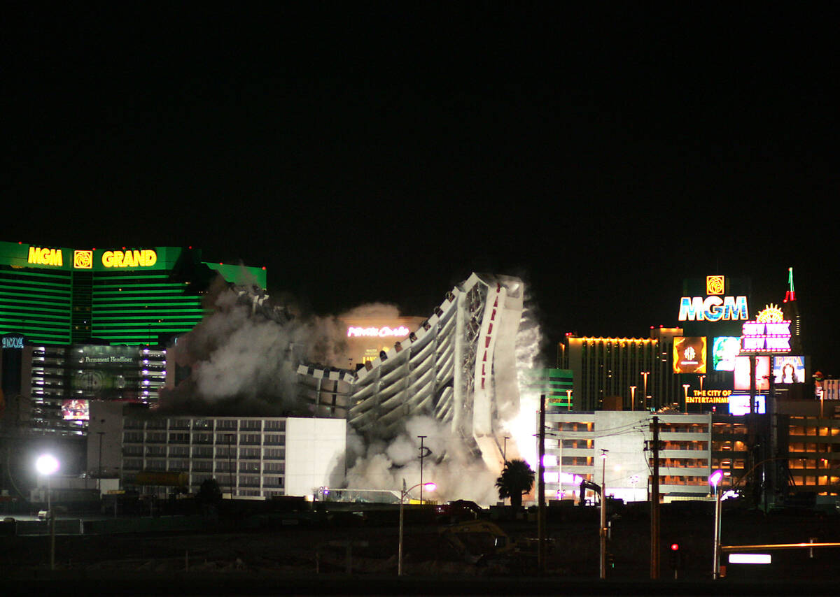 The Boardwalk hotel-casino begins to collapse in on itself as it is imploded May 9, 2006. (Revi ...