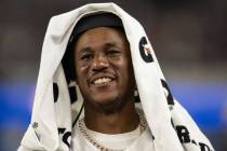 Las Vegas Raiders cornerback Marcus Peters (24) smiles during an NFL preseason football game ag ...