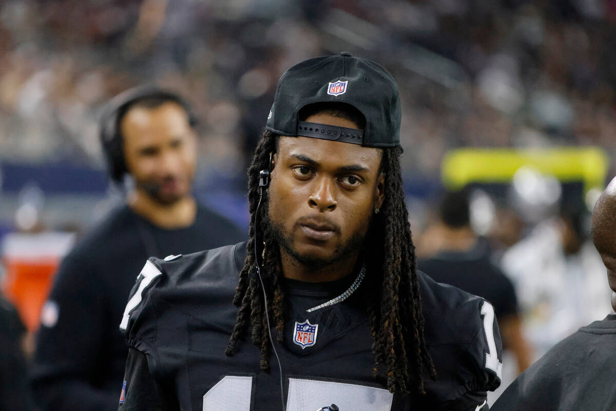 Las Vegas Raiders wide receiver Davante Adams (17) walks on the sideline during a preseason NFL ...